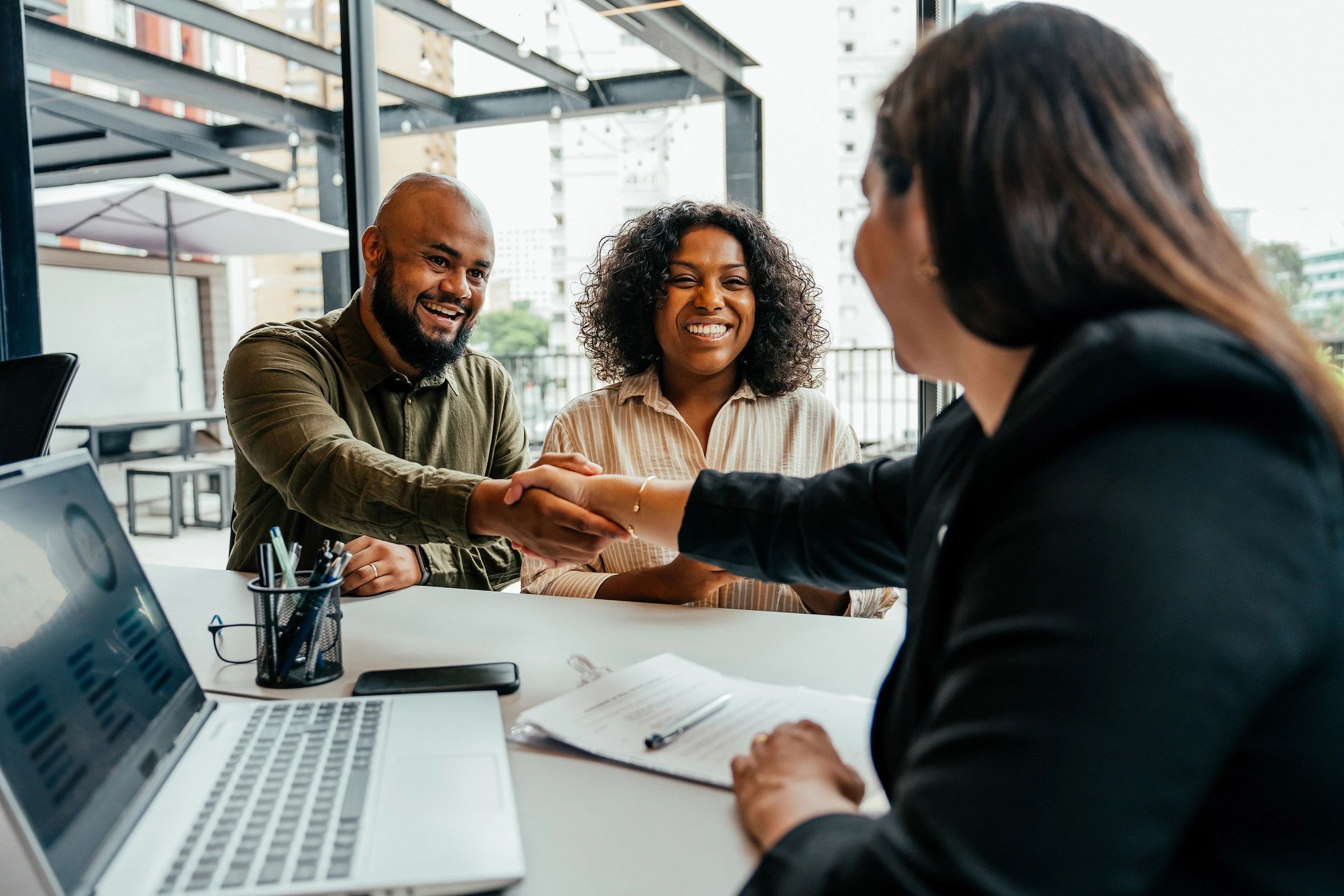 business professionals discussing loan options
