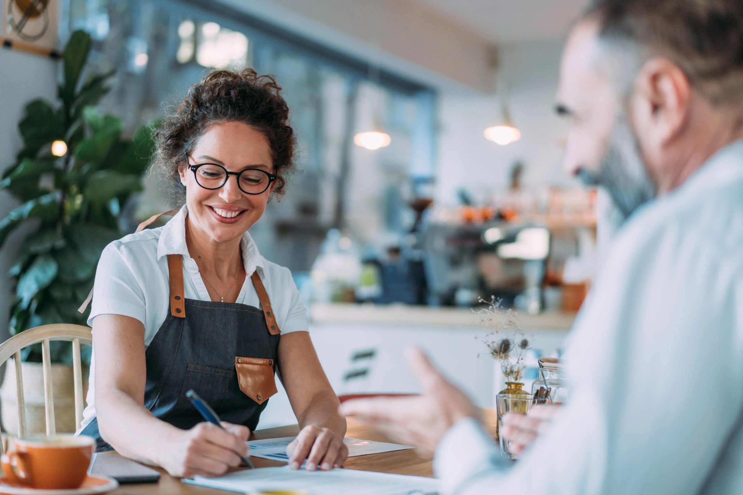 business owner consulting with a loan advisor